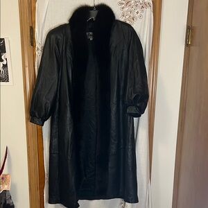 Chic Black Leather Jacket with Plush Trim